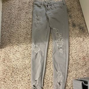 Grey ripped jeans (jegging style)